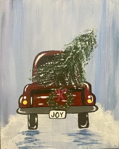 Painting of a red truck with a green evergreen tree, Christmas tree, in the trunk. License plate that says "JOY" snowy street and blue sky.