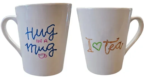 Custom Mugs, mugs with handwriting saying "Hug Mug" and "I [heart] tea"